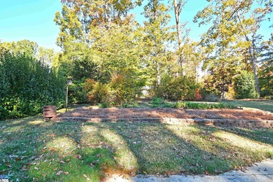 Discover this beautifully crafted all-brick 5-bedroom, 3-bath on Holly Tree Country Club in South Carolina - for sale on GolfHomes.com, golf home, golf lot