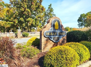Discover this beautifully crafted all-brick 5-bedroom, 3-bath on Holly Tree Country Club in South Carolina - for sale on GolfHomes.com, golf home, golf lot