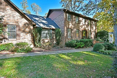 Discover this beautifully crafted all-brick 5-bedroom, 3-bath on Holly Tree Country Club in South Carolina - for sale on GolfHomes.com, golf home, golf lot