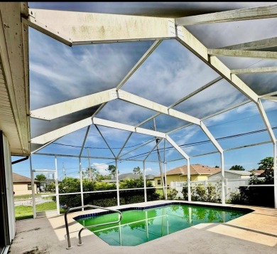 Welcome to your dream getaway in beautiful Englewood, Florida! on Oyster Creek Golf Club in Florida - for sale on GolfHomes.com, golf home, golf lot