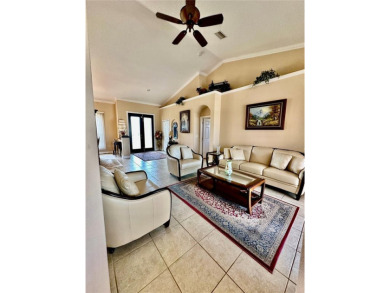 Welcome to your dream getaway in beautiful Englewood, Florida! on Oyster Creek Golf Club in Florida - for sale on GolfHomes.com, golf home, golf lot