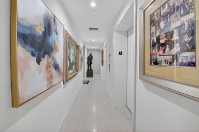 Dazzling golf and sparkling lake views await in this stunning on Boca West Golf and Country Club in Florida - for sale on GolfHomes.com, golf home, golf lot