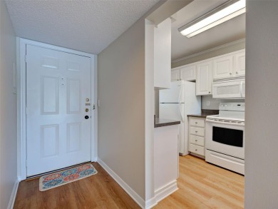 Beautifully RENOVATED and FRESHLY PAINTED condo with GOLF AND on Plantation Golf and Country Club in Florida - for sale on GolfHomes.com, golf home, golf lot