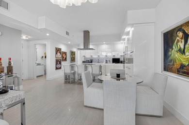 Dazzling golf and sparkling lake views await in this stunning on Boca West Golf and Country Club in Florida - for sale on GolfHomes.com, golf home, golf lot