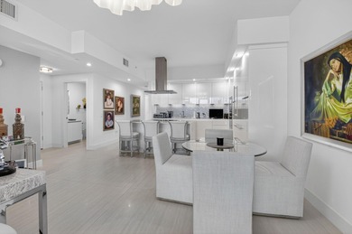 Dazzling golf and sparkling lake views await in this stunning on Boca West Golf and Country Club in Florida - for sale on GolfHomes.com, golf home, golf lot