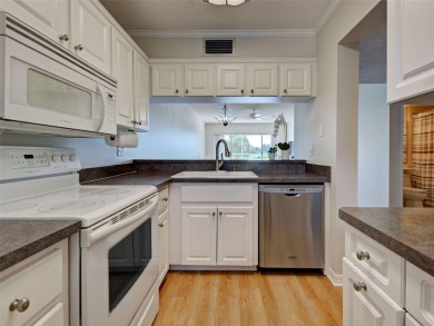 Beautifully RENOVATED and FRESHLY PAINTED condo with GOLF AND on Plantation Golf and Country Club in Florida - for sale on GolfHomes.com, golf home, golf lot