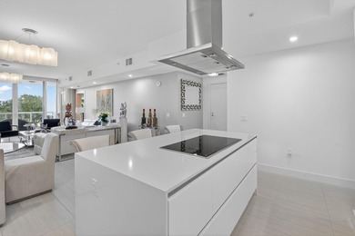 Dazzling golf and sparkling lake views await in this stunning on Boca West Golf and Country Club in Florida - for sale on GolfHomes.com, golf home, golf lot