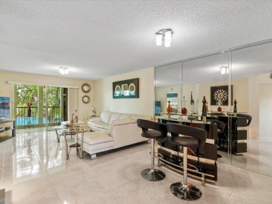 Impeccably maintained 2 bedroom / 2 bathroom, 1200+ Sq Ft unit on Flamingo Lakes Country Club in Florida - for sale on GolfHomes.com, golf home, golf lot