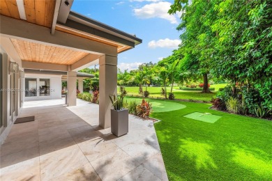 Tastefully remodeled estate overlooking the 15th hole of the on Riviera Country Club in Florida - for sale on GolfHomes.com, golf home, golf lot