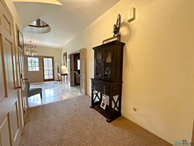 This stunning custom home, rich in history, was built by the on Spring River Golf Course in New Mexico - for sale on GolfHomes.com, golf home, golf lot