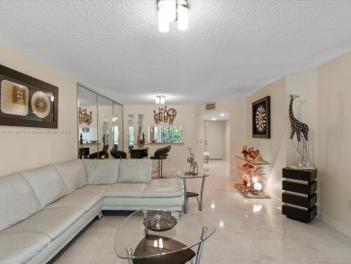 Impeccably maintained 2 bedroom / 2 bathroom, 1200+ Sq Ft unit on Flamingo Lakes Country Club in Florida - for sale on GolfHomes.com, golf home, golf lot