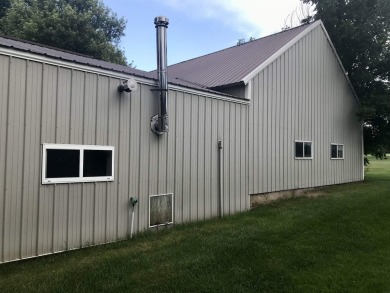 Welcome to 304 1st St, Elma, IA 50658--a gem nestled right next on Maple Heights Golf and Country Club in Iowa - for sale on GolfHomes.com, golf home, golf lot