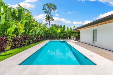 Tastefully remodeled estate overlooking the 15th hole of the on Riviera Country Club in Florida - for sale on GolfHomes.com, golf home, golf lot