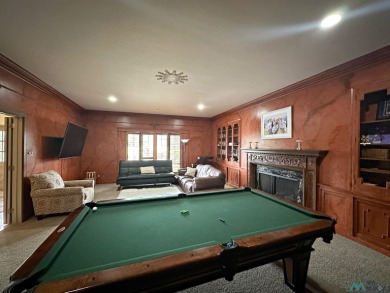 This stunning custom home, rich in history, was built by the on Spring River Golf Course in New Mexico - for sale on GolfHomes.com, golf home, golf lot