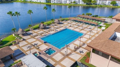 Impeccably maintained 2 bedroom / 2 bathroom, 1200+ Sq Ft unit on Flamingo Lakes Country Club in Florida - for sale on GolfHomes.com, golf home, golf lot