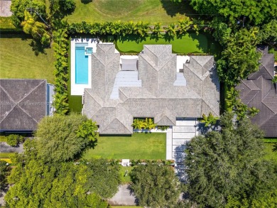 Tastefully remodeled estate overlooking the 15th hole of the on Riviera Country Club in Florida - for sale on GolfHomes.com, golf home, golf lot