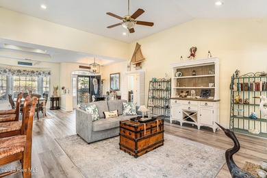 Live where every day feels like vacation! This custom, all brick on Sea Trail Golf Resort in North Carolina - for sale on GolfHomes.com, golf home, golf lot