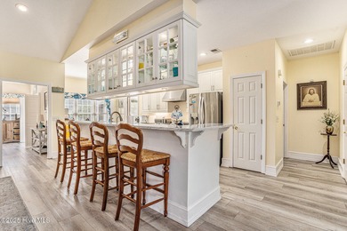 Live where every day feels like vacation! This custom, all brick on Sea Trail Golf Resort in North Carolina - for sale on GolfHomes.com, golf home, golf lot