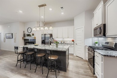 Experience elevated townhome living in the heart of Prosper's on PGA Americas Golf Course in Texas - for sale on GolfHomes.com, golf home, golf lot