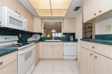 Enjoy spectacular golf views from this centrally located condo on Capri Isle Golf Club in Florida - for sale on GolfHomes.com, golf home, golf lot