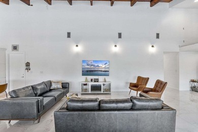 Modern yet inviting, this reimagined residence offers 2,897 sqft on Ocean Breeze Golf and Country Club in Florida - for sale on GolfHomes.com, golf home, golf lot