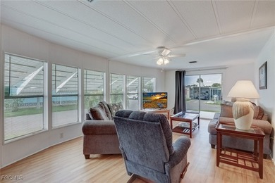 Enjoy the temperate winter weather with plenty of outdoor living on Riverbend Golf and Country Club in Florida - for sale on GolfHomes.com, golf home, golf lot