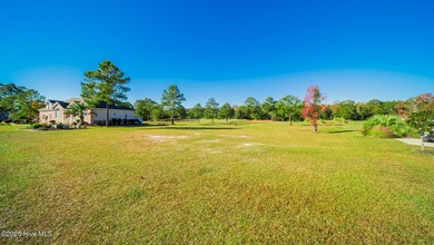 Over half an acre Golf Course Custom lot in the prestigious on Brunswick Plantation and Golf Resorts in North Carolina - for sale on GolfHomes.com, golf home, golf lot
