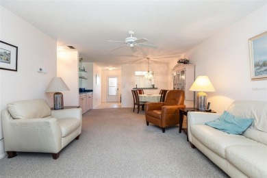 Enjoy spectacular golf views from this centrally located condo on Capri Isle Golf Club in Florida - for sale on GolfHomes.com, golf home, golf lot