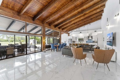 Modern yet inviting, this reimagined residence offers 2,897 sqft on Ocean Breeze Golf and Country Club in Florida - for sale on GolfHomes.com, golf home, golf lot