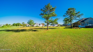 Over half an acre Golf Course Custom lot in the prestigious on Brunswick Plantation and Golf Resorts in North Carolina - for sale on GolfHomes.com, golf home, golf lot