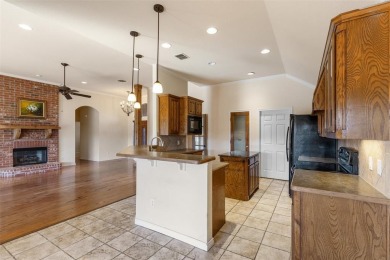 What a view!  This beautiful home looks over the 7th fairway of on Whitestone Golf Club in Texas - for sale on GolfHomes.com, golf home, golf lot