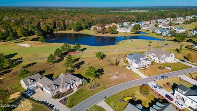 Over half an acre Golf Course Custom lot in the prestigious on Brunswick Plantation and Golf Resorts in North Carolina - for sale on GolfHomes.com, golf home, golf lot