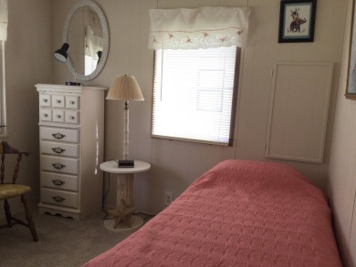 Meticulously maintained home in the much sought after community on Spanish Lakes I in Florida - for sale on GolfHomes.com, golf home, golf lot