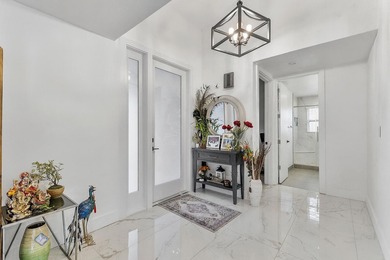 Modern yet inviting, this reimagined residence offers 2,897 sqft on Ocean Breeze Golf and Country Club in Florida - for sale on GolfHomes.com, golf home, golf lot