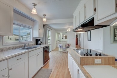 Enjoy the temperate winter weather with plenty of outdoor living on Riverbend Golf and Country Club in Florida - for sale on GolfHomes.com, golf home, golf lot