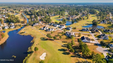 Over half an acre Golf Course Custom lot in the prestigious on Brunswick Plantation and Golf Resorts in North Carolina - for sale on GolfHomes.com, golf home, golf lot