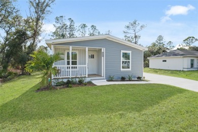 Cute as a button!!! This brand new home not is NOT in a flood on Bobcat Trail Golf Club in Florida - for sale on GolfHomes.com, golf home, golf lot
