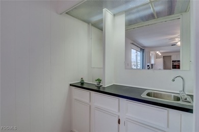 Enjoy the temperate winter weather with plenty of outdoor living on Riverbend Golf and Country Club in Florida - for sale on GolfHomes.com, golf home, golf lot