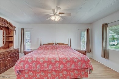 Enjoy the temperate winter weather with plenty of outdoor living on Riverbend Golf and Country Club in Florida - for sale on GolfHomes.com, golf home, golf lot