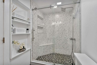 Modern yet inviting, this reimagined residence offers 2,897 sqft on Ocean Breeze Golf and Country Club in Florida - for sale on GolfHomes.com, golf home, golf lot