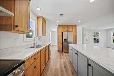Cute as a button!!! This brand new home not is NOT in a flood on Bobcat Trail Golf Club in Florida - for sale on GolfHomes.com, golf home, golf lot