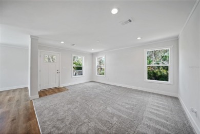 Cute as a button!!! This brand new home not is NOT in a flood on Bobcat Trail Golf Club in Florida - for sale on GolfHomes.com, golf home, golf lot