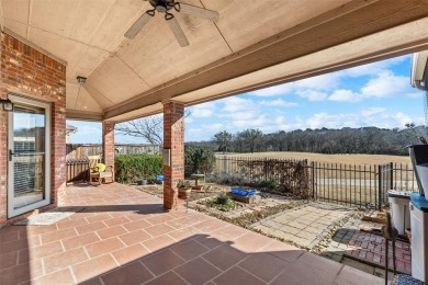 What a view!  This beautiful home looks over the 7th fairway of on Whitestone Golf Club in Texas - for sale on GolfHomes.com, golf home, golf lot