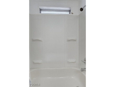 Enjoy the temperate winter weather with plenty of outdoor living on Riverbend Golf and Country Club in Florida - for sale on GolfHomes.com, golf home, golf lot