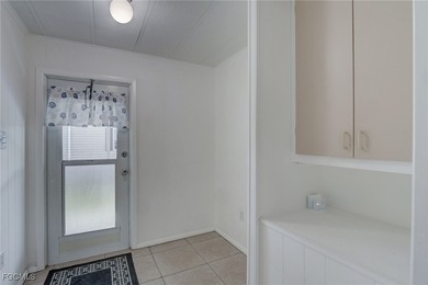 Enjoy the temperate winter weather with plenty of outdoor living on Riverbend Golf and Country Club in Florida - for sale on GolfHomes.com, golf home, golf lot