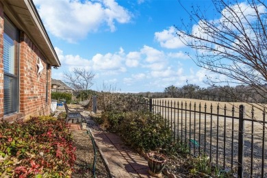 What a view!  This beautiful home looks over the 7th fairway of on Whitestone Golf Club in Texas - for sale on GolfHomes.com, golf home, golf lot