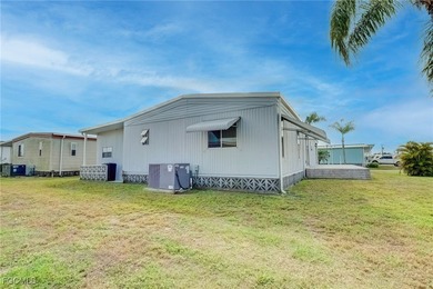 Enjoy the temperate winter weather with plenty of outdoor living on Riverbend Golf and Country Club in Florida - for sale on GolfHomes.com, golf home, golf lot