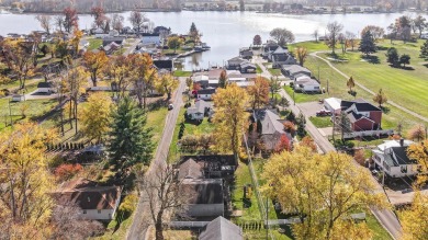 Lake living in this ranch style home that has a ton of on Harbor Hills Country Club in Ohio - for sale on GolfHomes.com, golf home, golf lot