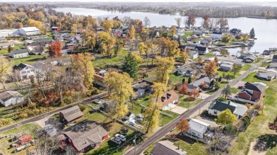 Lake living in this ranch style home that has a ton of on Harbor Hills Country Club in Ohio - for sale on GolfHomes.com, golf home, golf lot