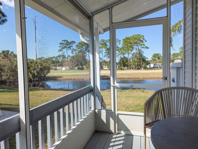 Just bring your toothbrush and relax on the back screened porch on The Great Outdoors Golf and Country Club in Florida - for sale on GolfHomes.com, golf home, golf lot